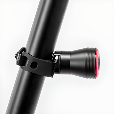 VK-Q5 rear light mounted on a seatpost with the rubber strap mount
